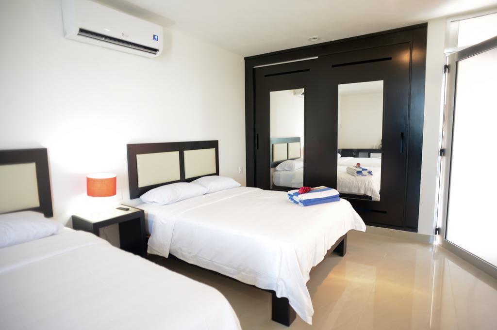 Sunrise 42 Suites Hotel Плайя-дель-Кармен Номер фото